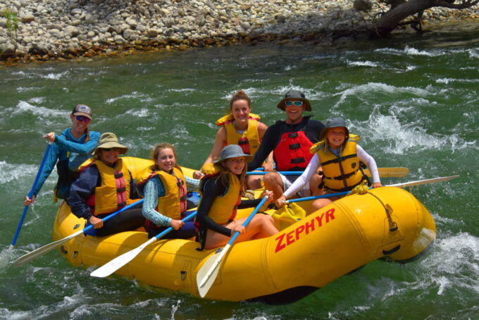 Family rafting together in California